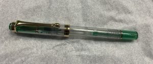 Green and gold fountain pen